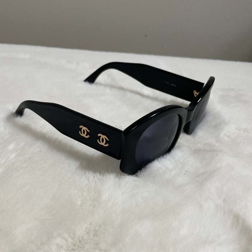 CHANEL Black Sunglasses with Gold Accents